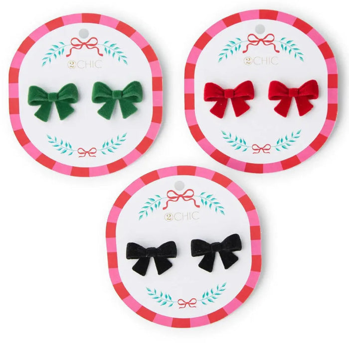 Three circular packages, bow errings in green, red, and black bows on a white background.