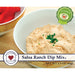 A bowl of salsa ranch dip mix with a clearly labeled packaging on the side.