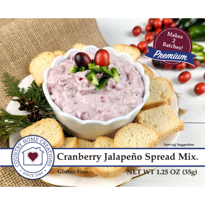A jar of cranberry jalapeño spread mix, showcasing a vibrant red color with visible jalapeño pieces and spices.