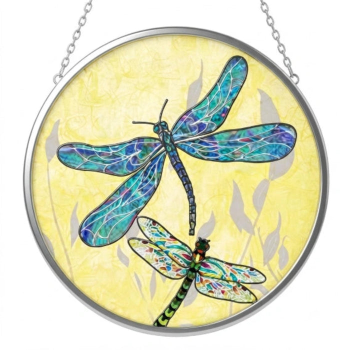 Bridgeton Hall 4.5-inch stained-glass-style dragonfly suncatcher featuring colorful wings, hanging in a sunny window and reflecting vibrant light.