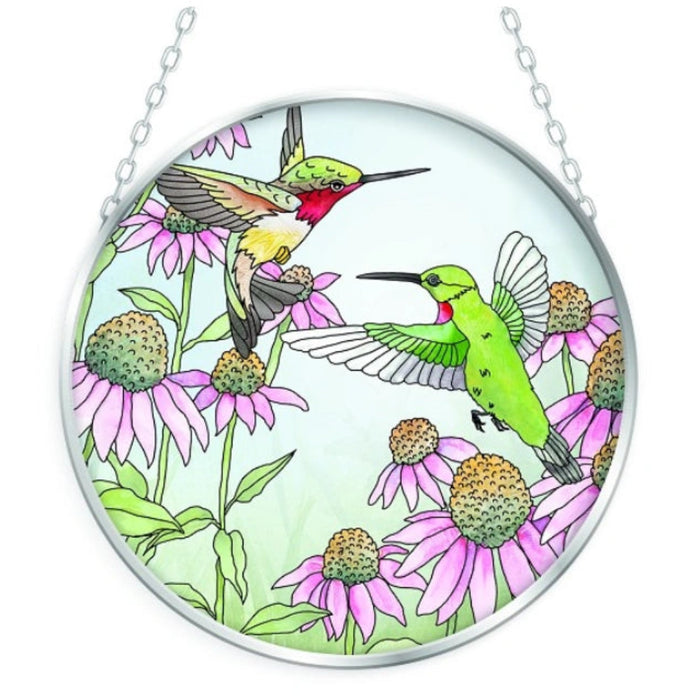 This Bridgeton Hall Hummingbirds and Coneflowers Suncatcher brings vibrant color and the beauty of nature to your home décor.
