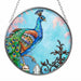 Bridgeton Hall 4.5-inch Jewel of the Garden stained-glass-style suncatcher featuring colorful jewel-toned floral and garden-inspired artwork hanging in a sunny window.