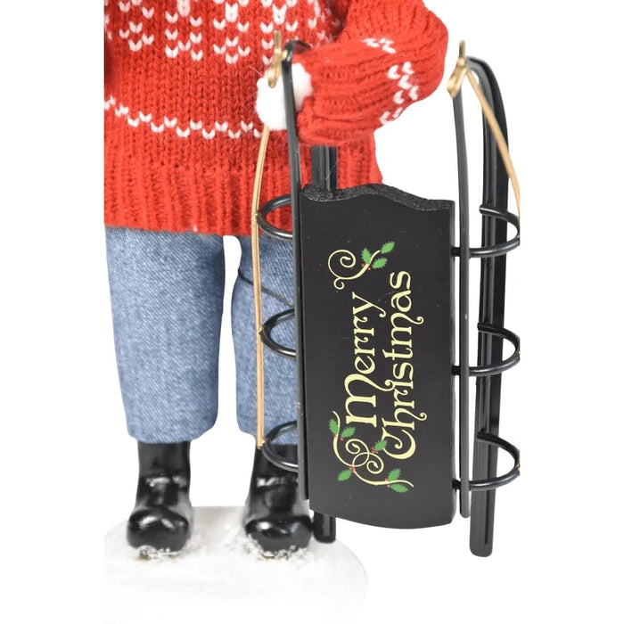 Byers’ Choice Sledding Girl collectible for Christmas décor focused on the sled design