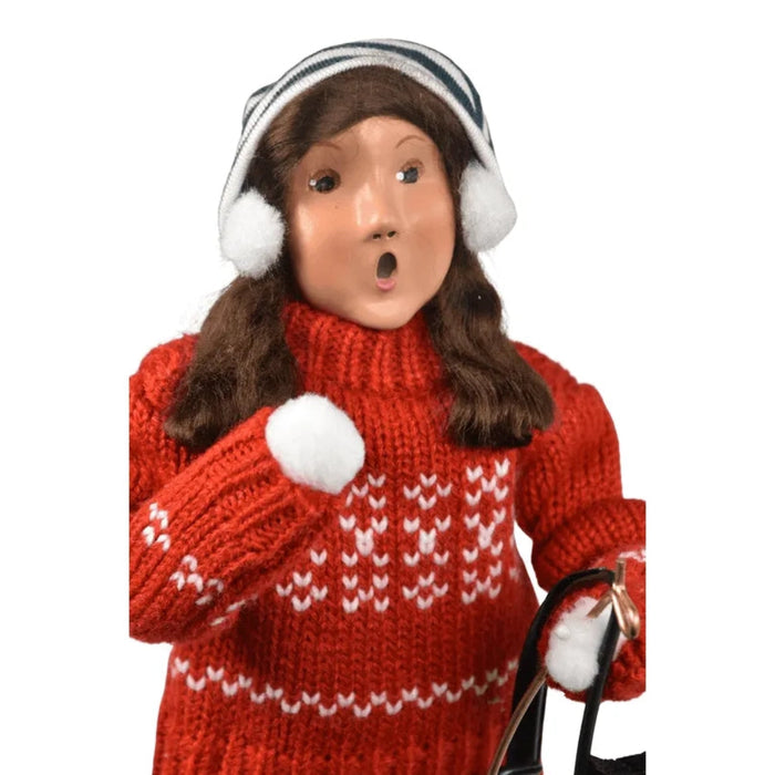 “10-inch Byers’ Choice Sledding Girl figurine in knit sweater
