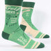 Green golf-themed socks with text on a white background