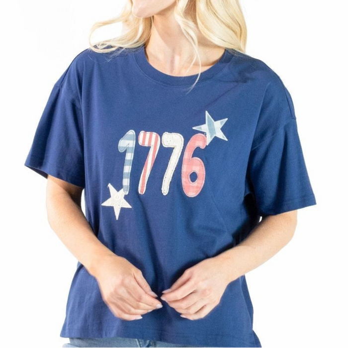 Featuring a bold "1776" design accented with stars and a distressed red, white, and blue pattern