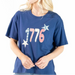 Featuring a bold "1776" design accented with stars and a distressed red, white, and blue pattern