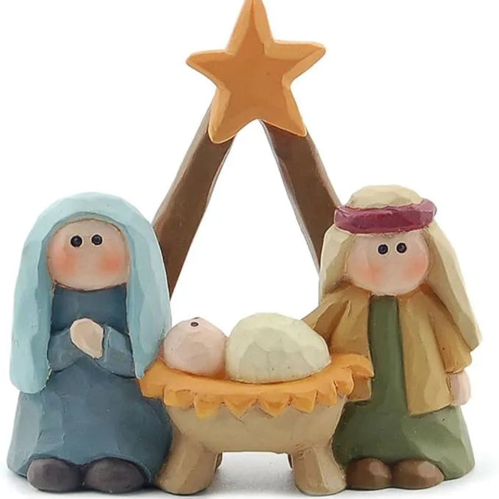 Blossom Bucket mini nativity figurine with Mary in blue, Joseph in green, and baby Jesus beneath a gold star.