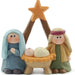 Blossom Bucket mini nativity figurine with Mary in blue, Joseph in green, and baby Jesus beneath a gold star.