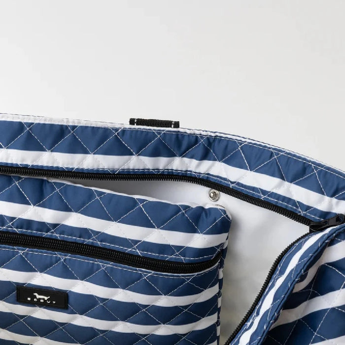 A blue and white striped tote bag paired with a matching pouch, ideal for casual outings or beach trips.
