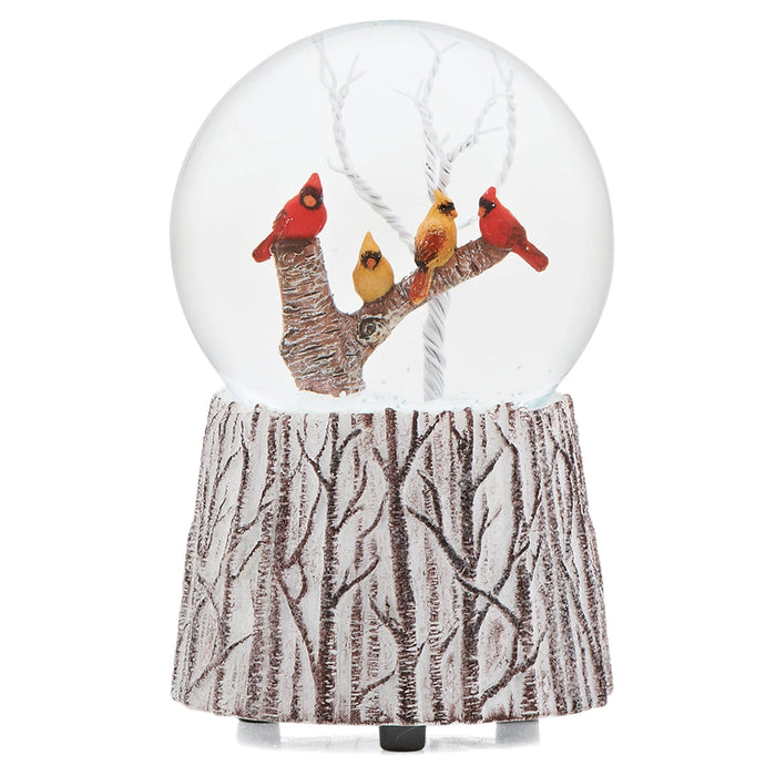 Roman musical glitter dome featuring colorful cardinals perched on a decorative branch with swirling glitter.