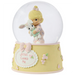 This snow globe, a young girl snuggles her sweet bunny.