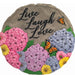 The Spoontiques Live Laugh Love Stepping Stone features an uplifting sentiment in a beautifully crafted resin design.