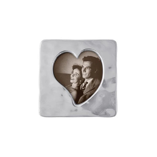A decorative photo frame featuring a heart shape design, ideal for displaying cherished memories.