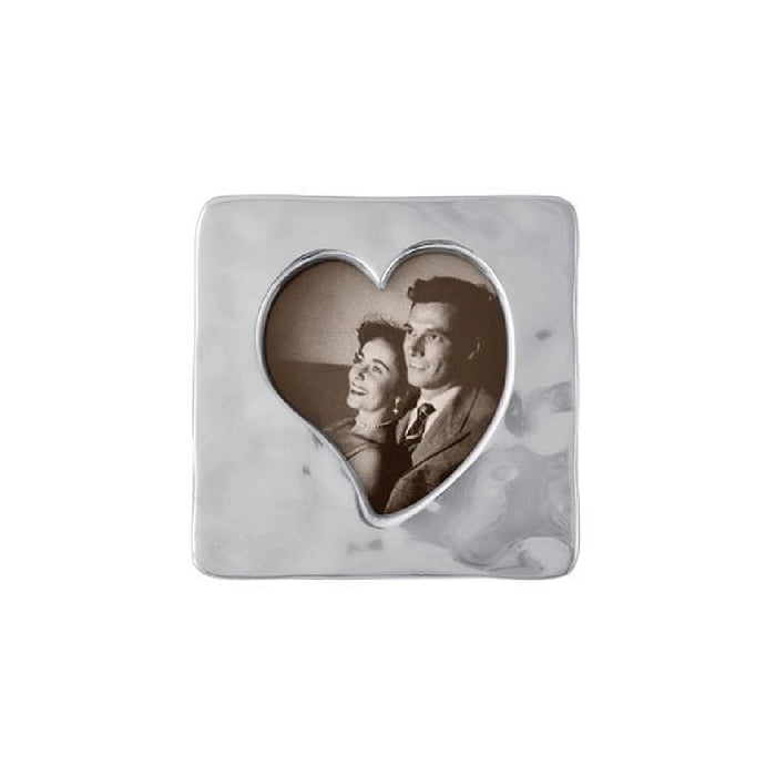A decorative photo frame featuring a heart shape design, ideal for displaying cherished memories.