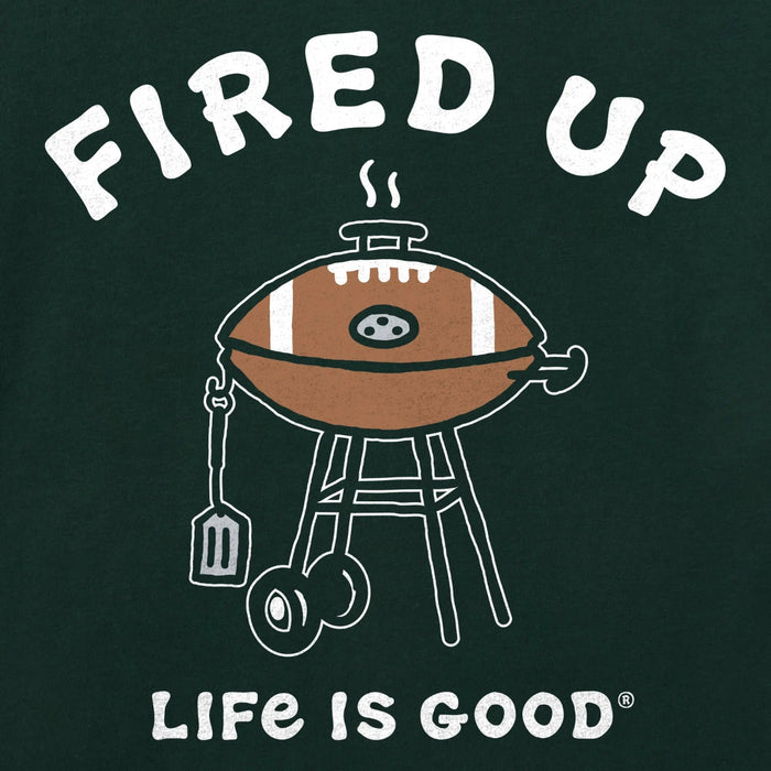 Graphic design of a barbecue with a football on top, labeled 'Fired Up', with 'Life is Good' branding.