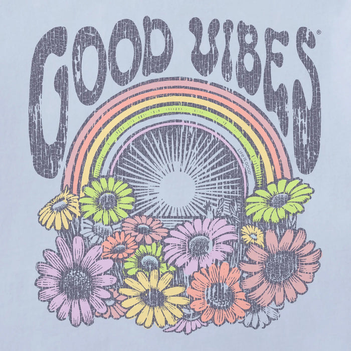 Design with 'Good Vibes' text, rainbow, and flowers on a light blue background