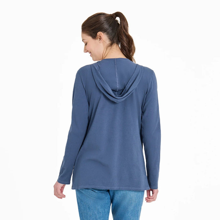 Woman wearing a blue hoodie on a white background