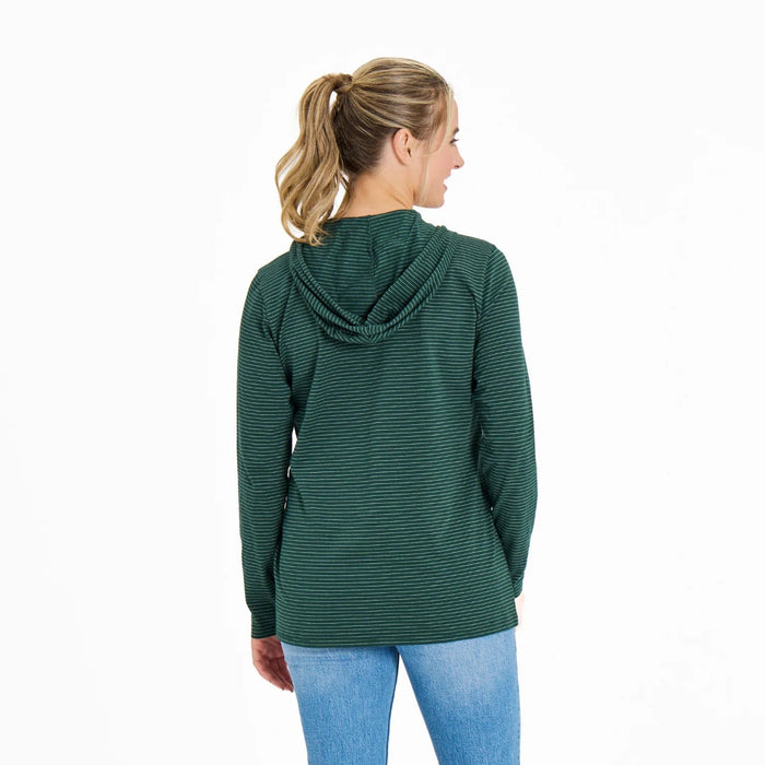 Woman wearing a green hooded jacket on a white background