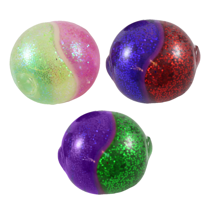 Three colorful glittery balls on a white background