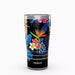 A black tumbler featuring a vibrant tropical print design.