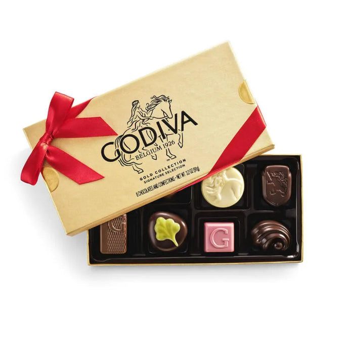 Godiva chocolate box with a red ribbon on a white background