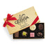 Godiva chocolate box with a red ribbon on a white background