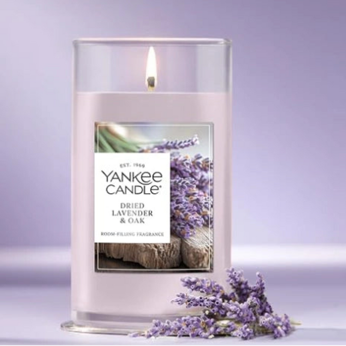 The Yankee Candle Dried Lavender & Oak Medium Pillar Candle blends soft floral lavender with rich, grounding oak for a sophisticated aroma. 