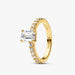 A stunning emerald cut diamond engagement ring crafted in yellow gold, highlighting its timeless beauty.