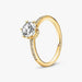 Gold ring with a diamond on a white background
