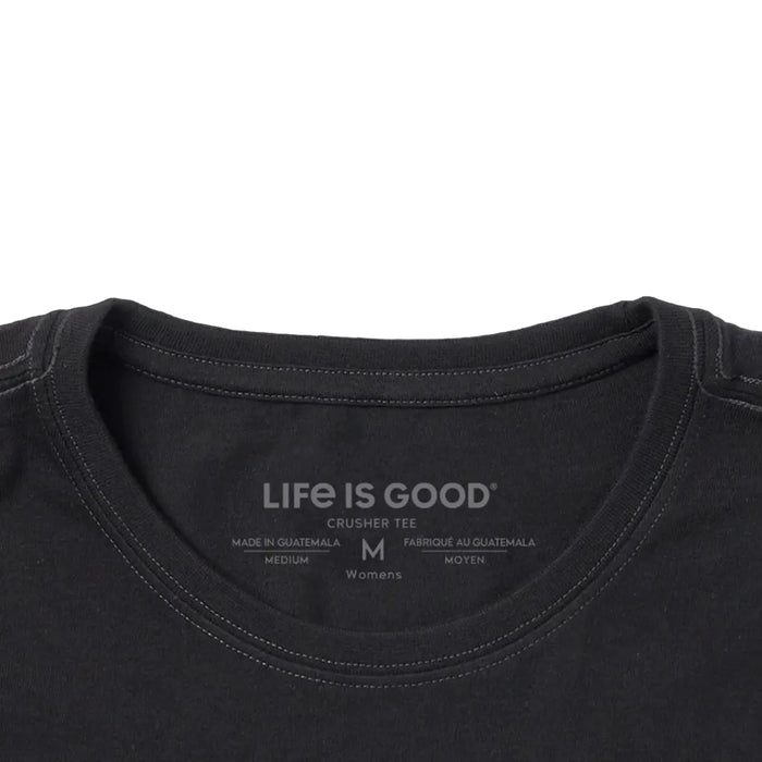 Women's All We Need Is Love & Blooms short sleeve Crusher T-shirt featuring a floral graphic with an inspirational message, crew neckline, and relaxed garment-washed fit for everyday wear.