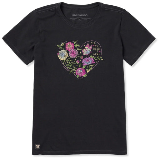 Women's All We Need Is Love & Blooms short sleeve Crusher T-shirt featuring a floral graphic with an inspirational message, crew neckline, and relaxed garment-washed fit for everyday wear.