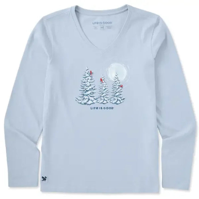 Life Is Good women's long sleeve Crusher Tee featuring snowy pine trees and colorful cardinals