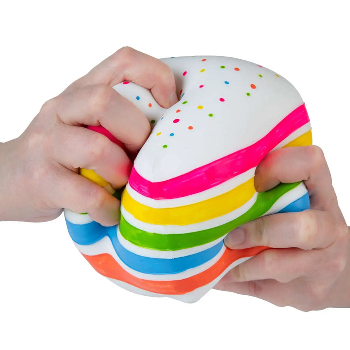 Orb Toys Easy Sqweezy Cake Squishy Squeeze Toy featuring a fun cake-shaped design.
