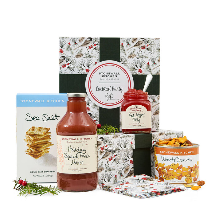 Stonewall Kitchen gift set with various items including a bottle of holiday spiced punch mixer, sea salt crackers, ultimate bar mix, and red pepper jelly.