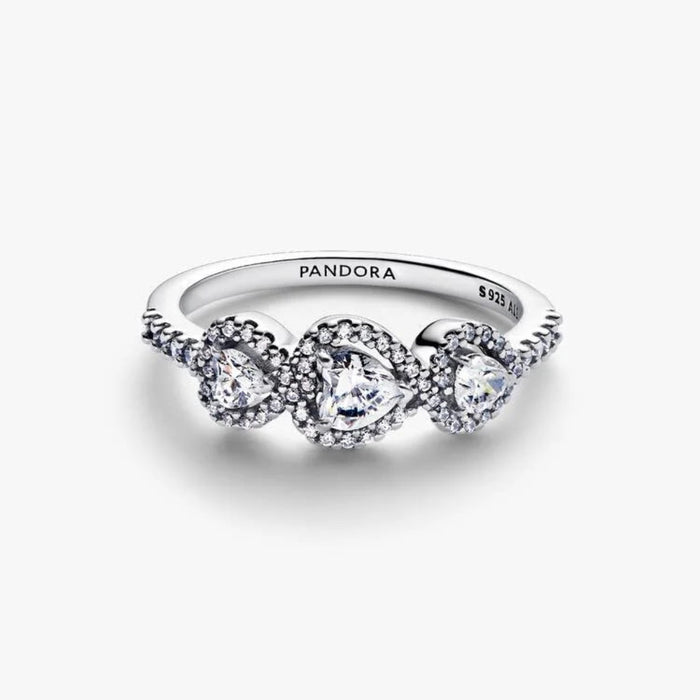 Pandora Halo Heart Trilogy Ring in sterling silver with heart-shaped halo stones.