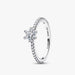 A diamond flower ring featuring a delicate white gold band, showcasing intricate floral designs with sparkling gemstones.