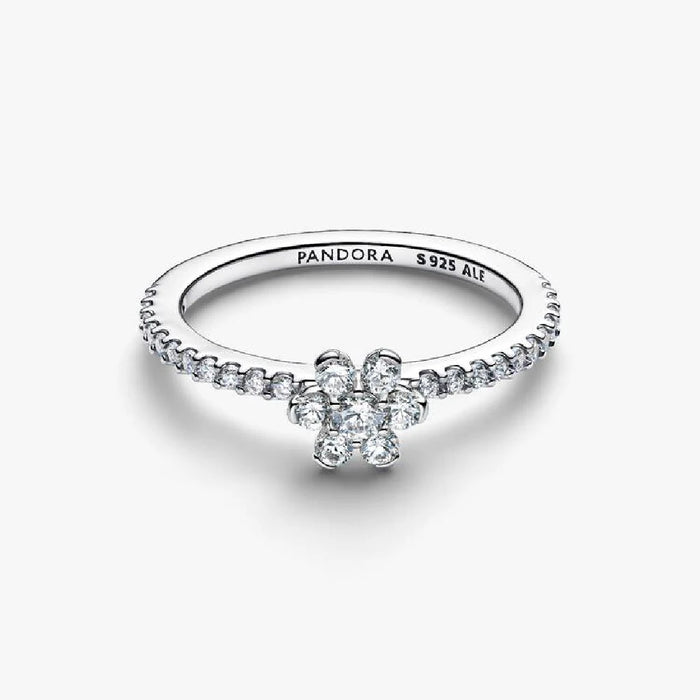 Elegant diamond flower ring set on a white gold band, highlighting a beautiful floral arrangement of shimmering diamonds.
