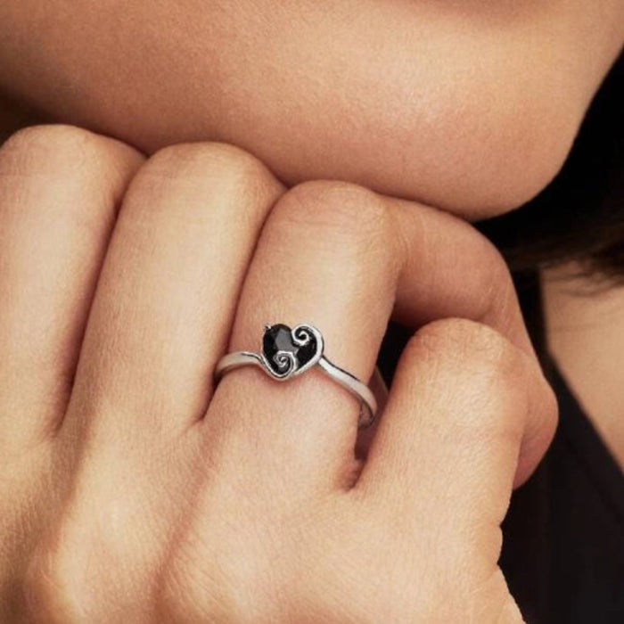 PANDORA Jack Skellington's Black Heart ring inspired by Disney's The Nightmare Before Christmas, featuring a bold black heart centerpiece with intricate gothic-inspired details.