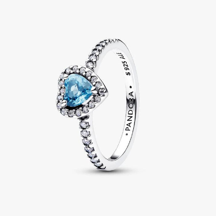 Hallmark Pandora Rings A ring featuring a blue topaz center stone surrounded by sparkling ...