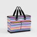 A colorful striped tote bag featuring black handles, ideal for shopping or casual outings.