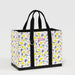 A tote bag featuring a vibrant design of lemons and colorful flowers.