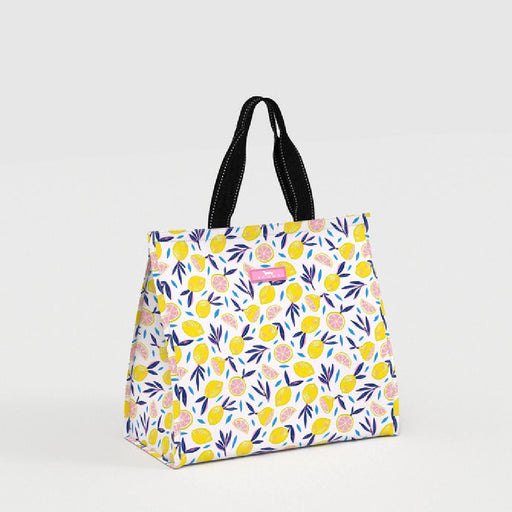 A tote bag featuring a white background adorned with a vibrant yellow floral print.