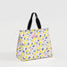 A tote bag featuring a white background adorned with a vibrant yellow floral print.