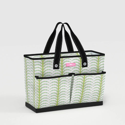 A tote bag featuring a design of green leaves on a light background.