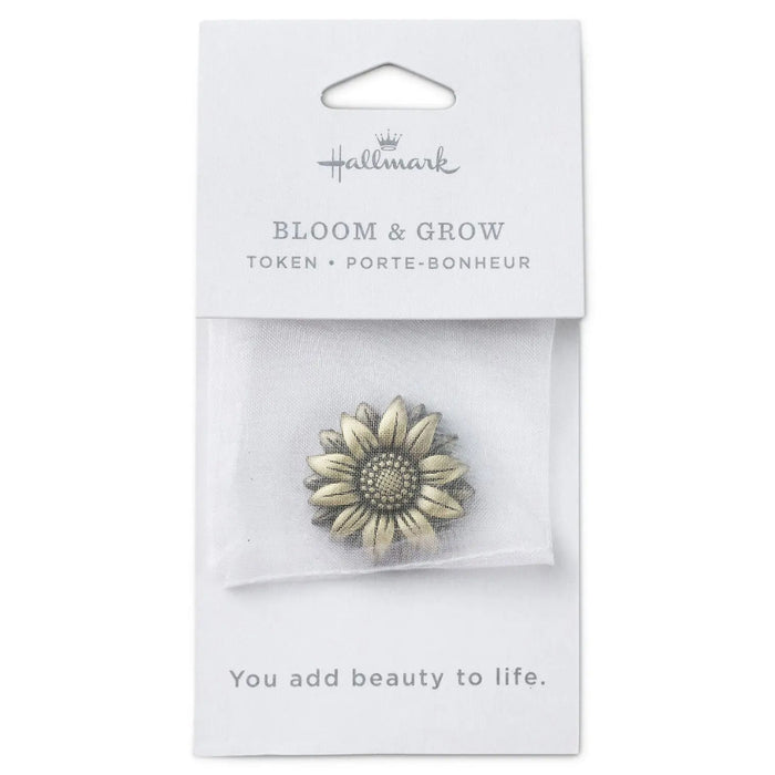 Sunflower‑shaped antiqued bronze encouragement token in Hallmark packaging 