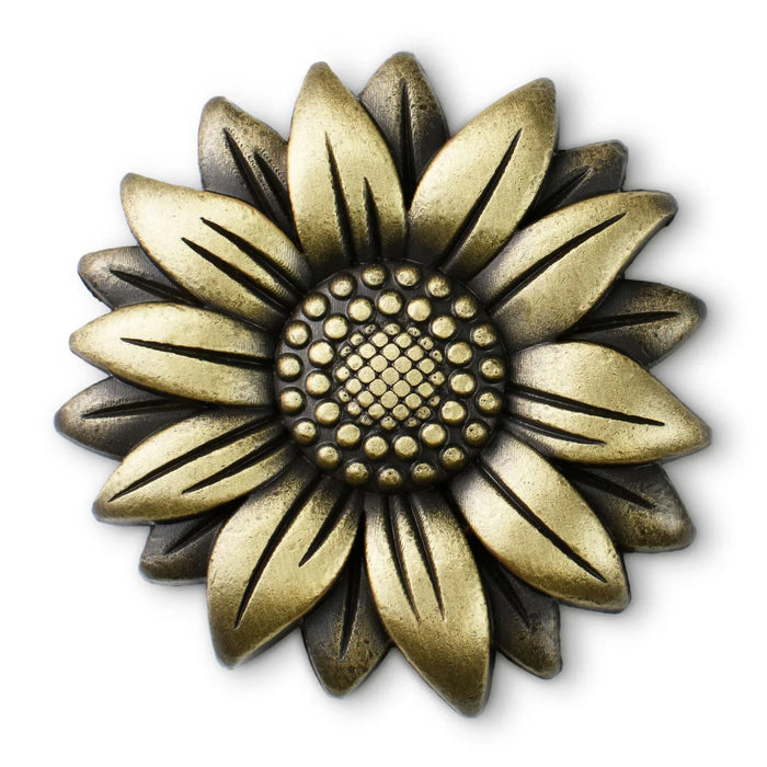 Sunflower‑shaped metal encouragement token with antiqued bronze finish