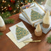 Hallmark Christmas Tree to Cross Religious Boxed Christmas Cards, pack of 12, featuring a Christmas tree and cross-inspired religious design.