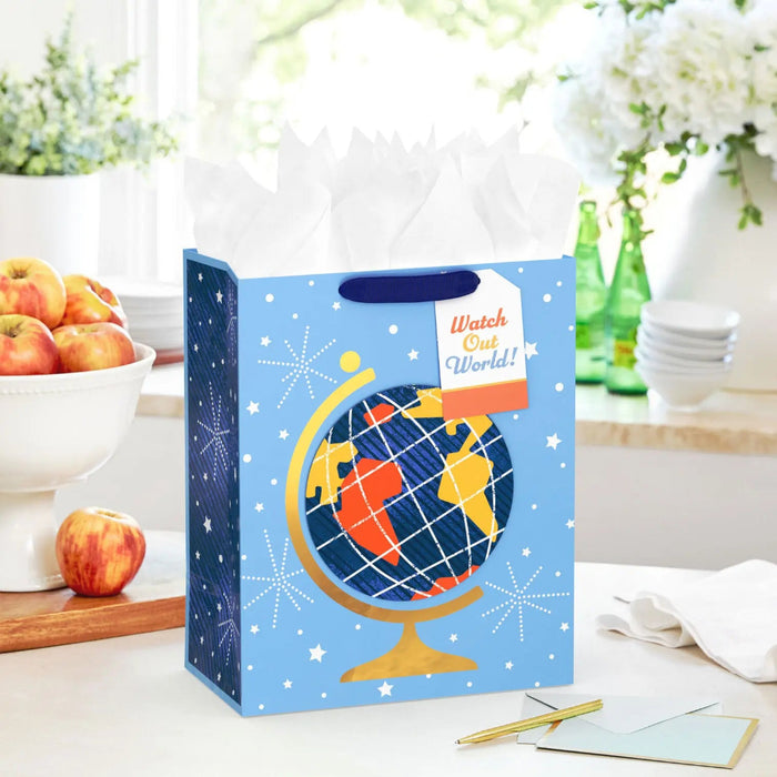 gift bag shown on a table with a card