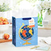 gift bag shown on a table with a card